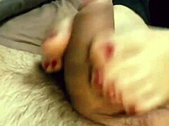 Step-sis gives footjob for step-dad's pleasure