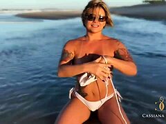 MILF flaunts assets on beach