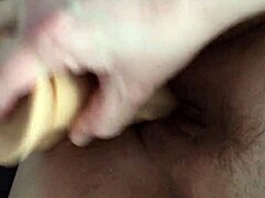 Chubby wife using a large sex toy for pleasure